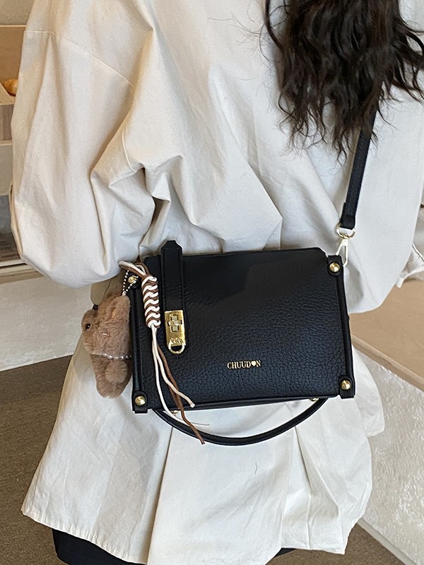 Bolsos retro retro de alta calidad para mujeres 2026 nueva textura lichi bolso pequeño estilo coreano simple mochila de hombro