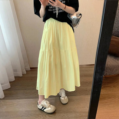 ダイコンのおじさんの半身のスカートの女性の春の夏の高腰の字のスカートの文芸の百合の傘のスカートは腰を緩めて股を遮ってやせている字のスカートを現します。