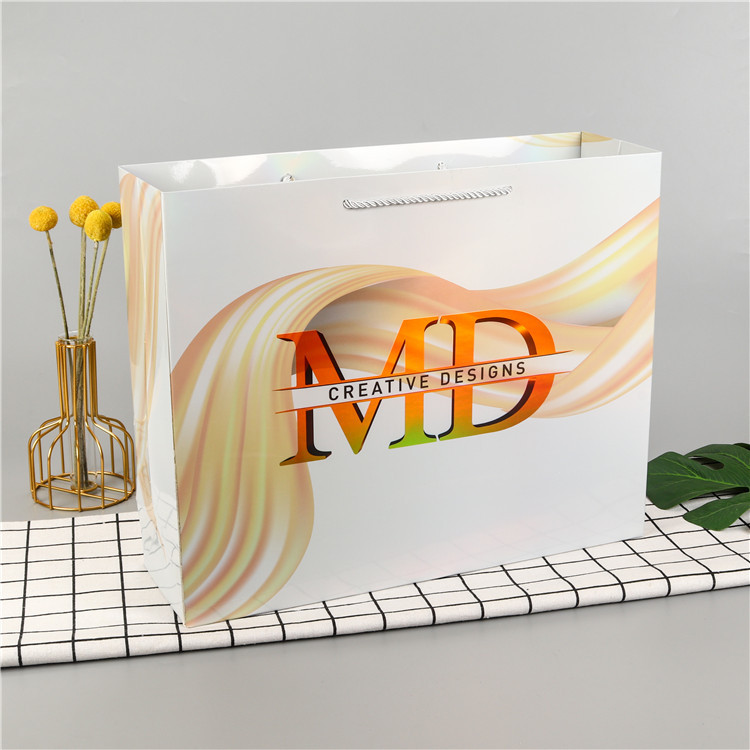 牛皮纸礼品袋子小批量卡通白卡手提纸袋现货服装店大购物礼物袋