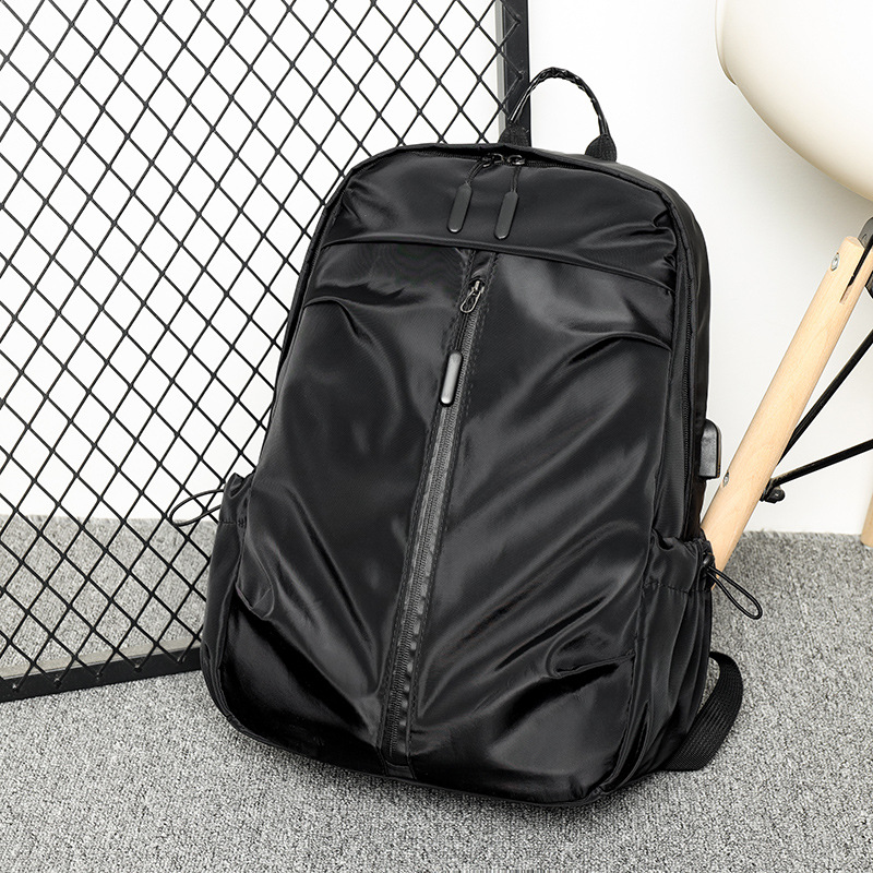 Wholesale large-capacity men's backpack, business casual lightweight laptop bag, waterproof travel backpack, stylish student schoolbag