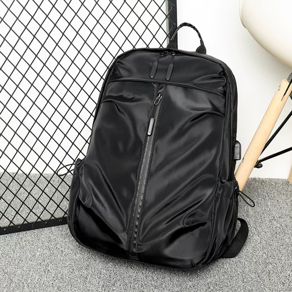 Wholesale large-capacity men's backpack, business casual lightweight laptop bag, waterproof travel backpack, stylish student schoolbag