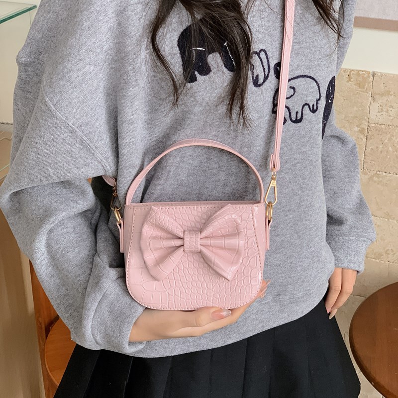 Dulce pequeño fresco bolso de hombro infantil lindo arco de color sólido bolso para padres e hijos nuevo bolso de accesorios para niñas