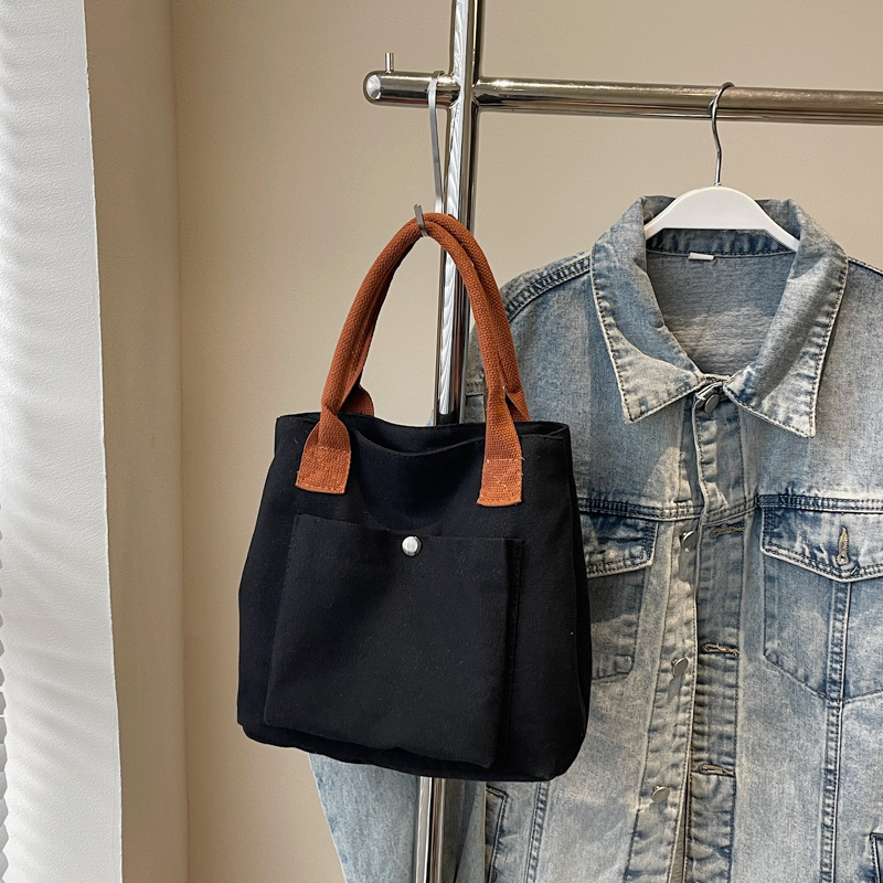 2024 nuevo bolso de lona para mujeres tela japonesa retro simple versátil Harajuku bolso de mano de color sólido casual de moda para mujeres