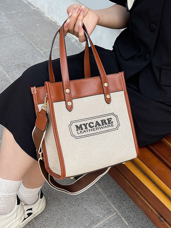 Bolso de mochila para mujeres 2025 nuevos productos transfronterizos de color de mano vertical tote de alta calidad bolsa de compras de transporte