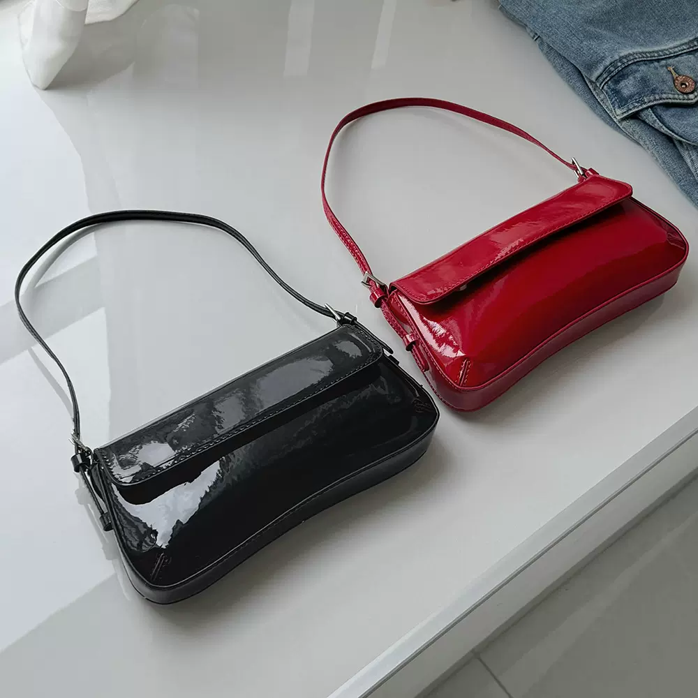 简约纯色手提法棍包女包2026新款时尚百搭单肩通勤包高颜值斜挎包