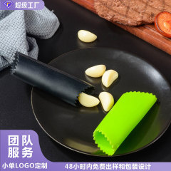 新しいストライプのシリカゲルはニンニクを剥ぎ取る器を卸売りします。