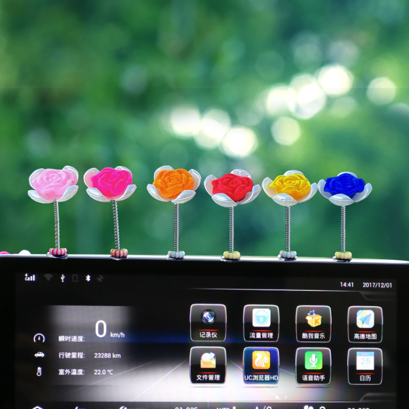 Tendencia nuevo producto flocado rosa coche sacudiendo la cabeza pequeños adornos decoración de primavera tablero accesorios de coche ventana