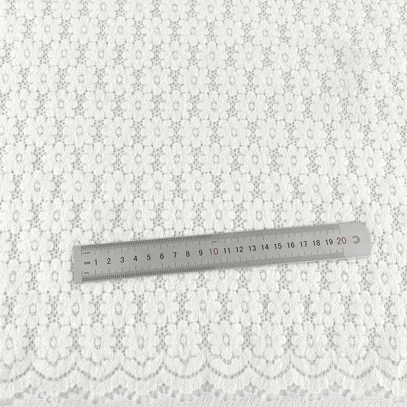 爆款秋冬弹力羽毛纱蕾丝网布镂空小花朵打底衫服装面料杏色高弹力