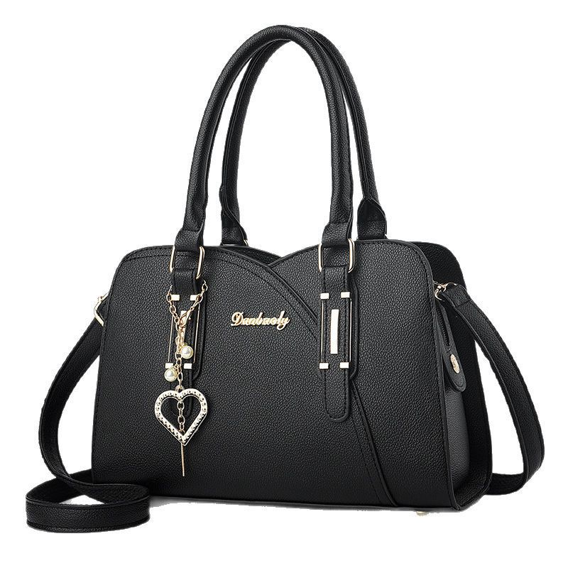 Emballado amor bolsos de mano colgantes de gran capacidad temperamento mochila de mochila casual de moda versátil bolsos de hombro transfronterizos