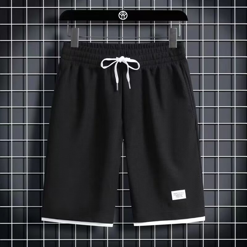 Camisa menos ropa Waffle pantalones de cinco puntos para hombres verano nuevo estilo estilo Hong Kong pantalones cortos de dos piezas falsos de color recto suelto