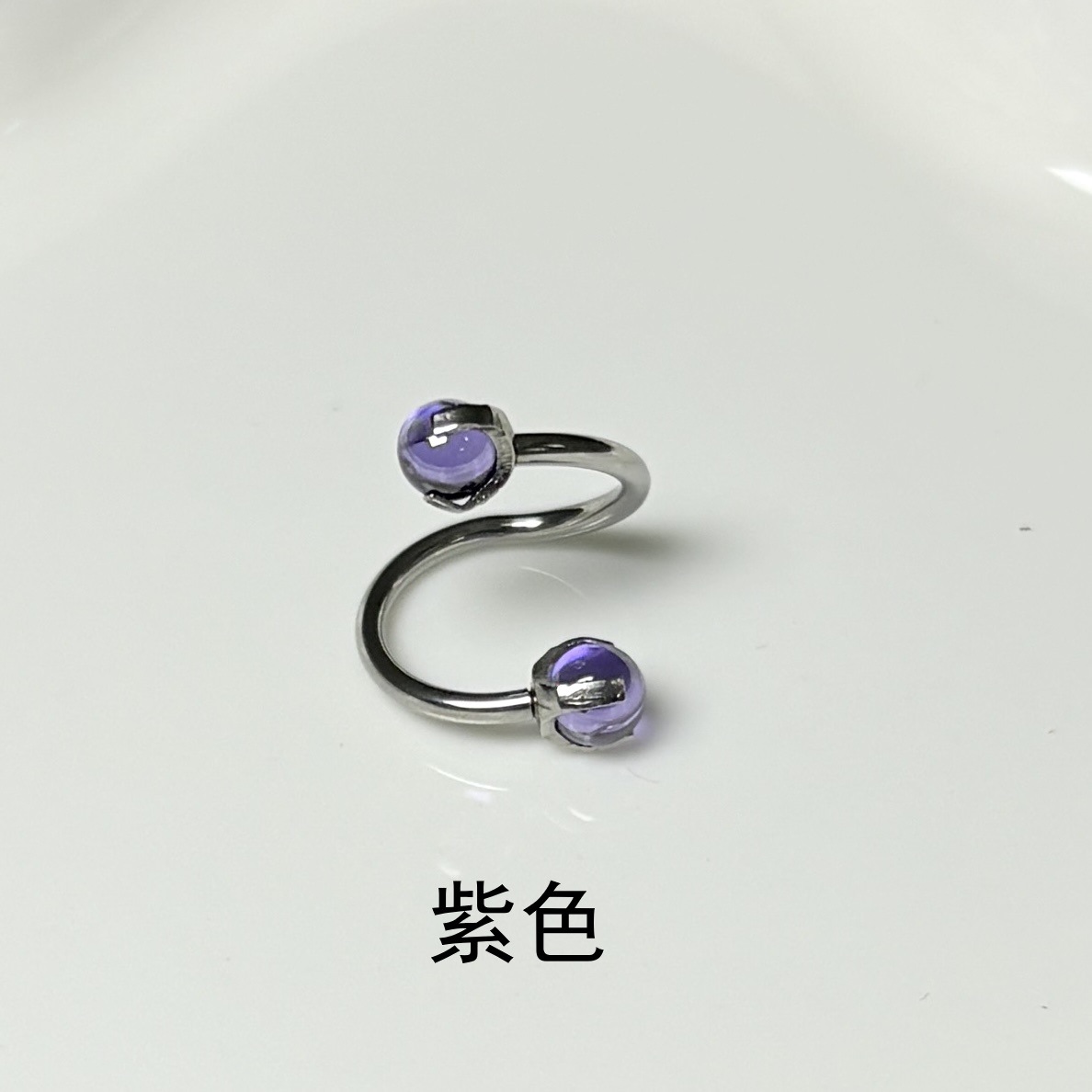 Silver pointed spike labret stud material detail