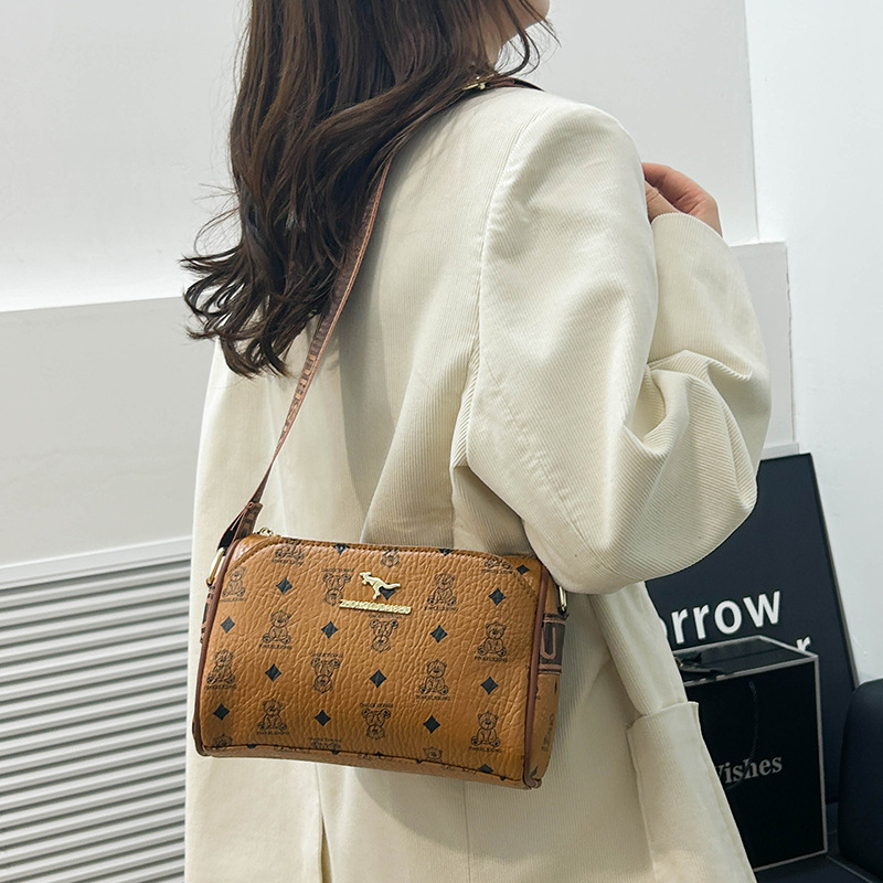 Primavera y otoño nueva moda moda temperamento hombro con bolsos de ocio de dibujos animados fabricantes de bolsos de mujer exportación al por mayor de comercio exterior transfronterizo