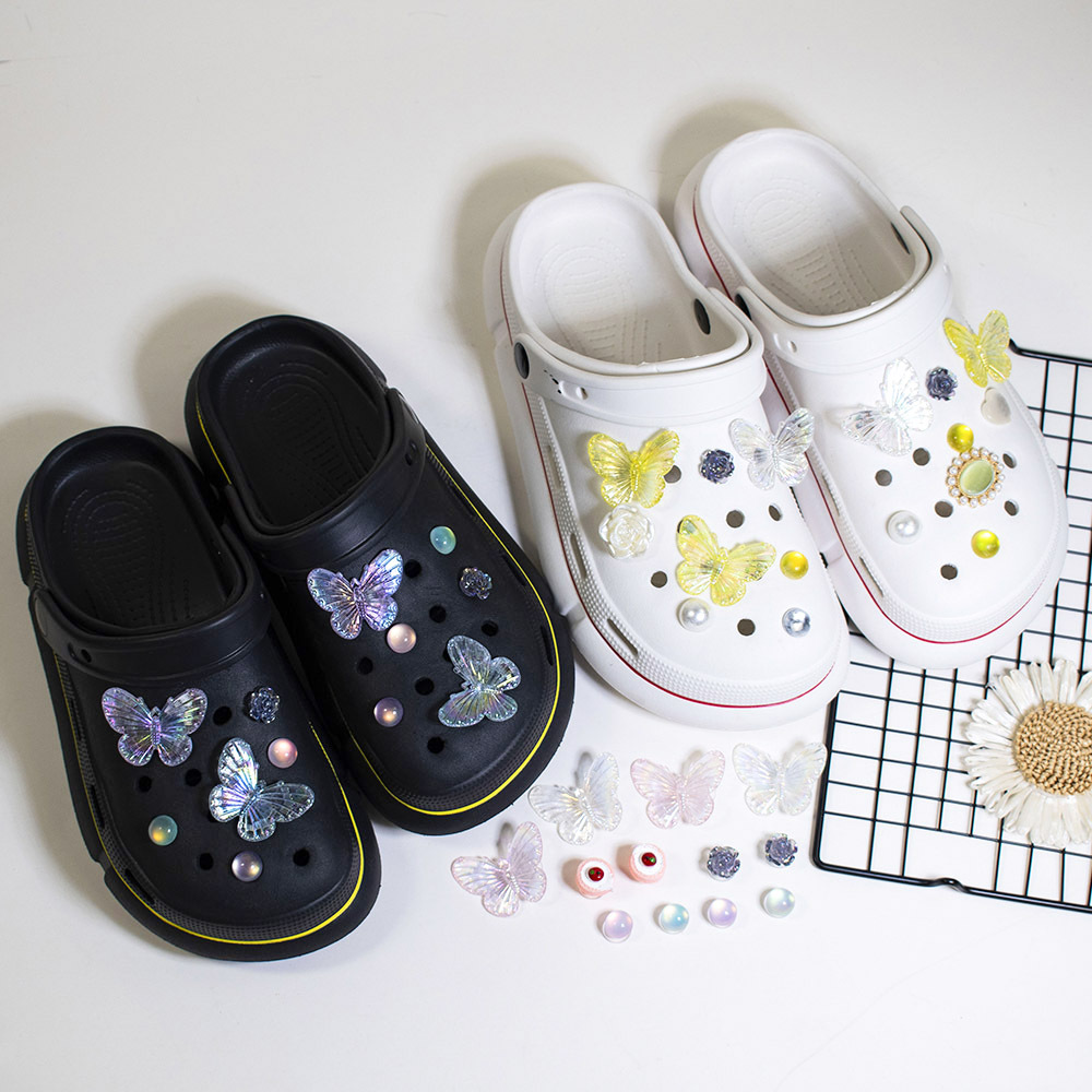 Crocs-style slippers with butterfly