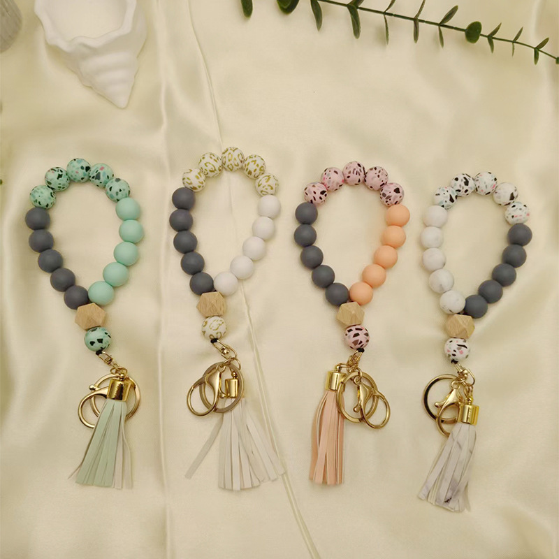 Cross-Border Hot Selling Fashion Printed Silicone Bead Bracelet Keychain Leather Tassel Bag Pendant Bracelet Key Ring Buckle Cross-Border Hot Selling Fashion Printed Silicone Bead Bracelet Keychain Leather Tassel Bag Pendant Bracelet Key Ring Buckle