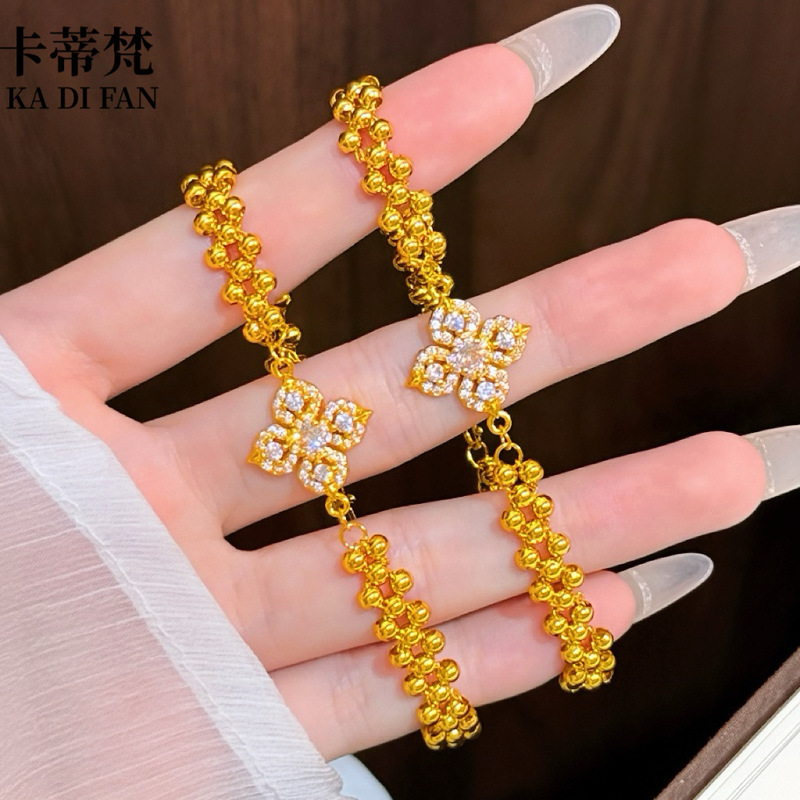 Same style as the gold shop's sand gold studded four-leaf vajra polished bead woven bracelet. Wholesale of Chinese-style light luxury sand gold jewelry Same style as the gold shop's sand gold studded four-leaf vajra polished bead woven bracelet. Wholesale of Chinese-style light luxury sand gold jewelry