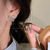 Silver needle, design earrings with bow, silver 925 sample, trend of season