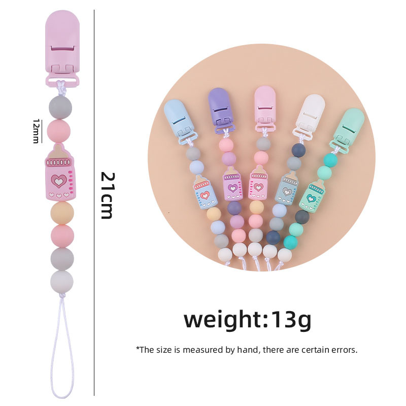 Nuevo bebé suministros clip de plástico de color calmante bebé de dibujos animados biberón de silicona mordedura pezón cadena anti-caída