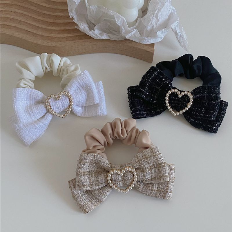 Delicate small Chanel-style French classic elegant flannel skirt lady temperament brown bow hair clip elastic hair tie