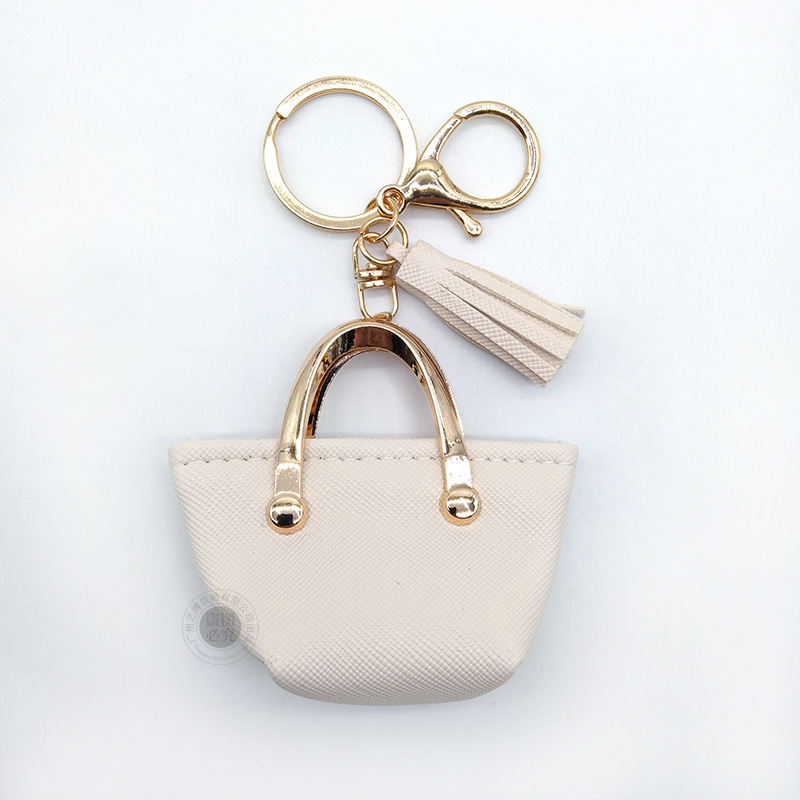 Llavero para mujer, bolso, colgante, joyería, mini monedero de almacenamiento de cuero lindo europeo y americano