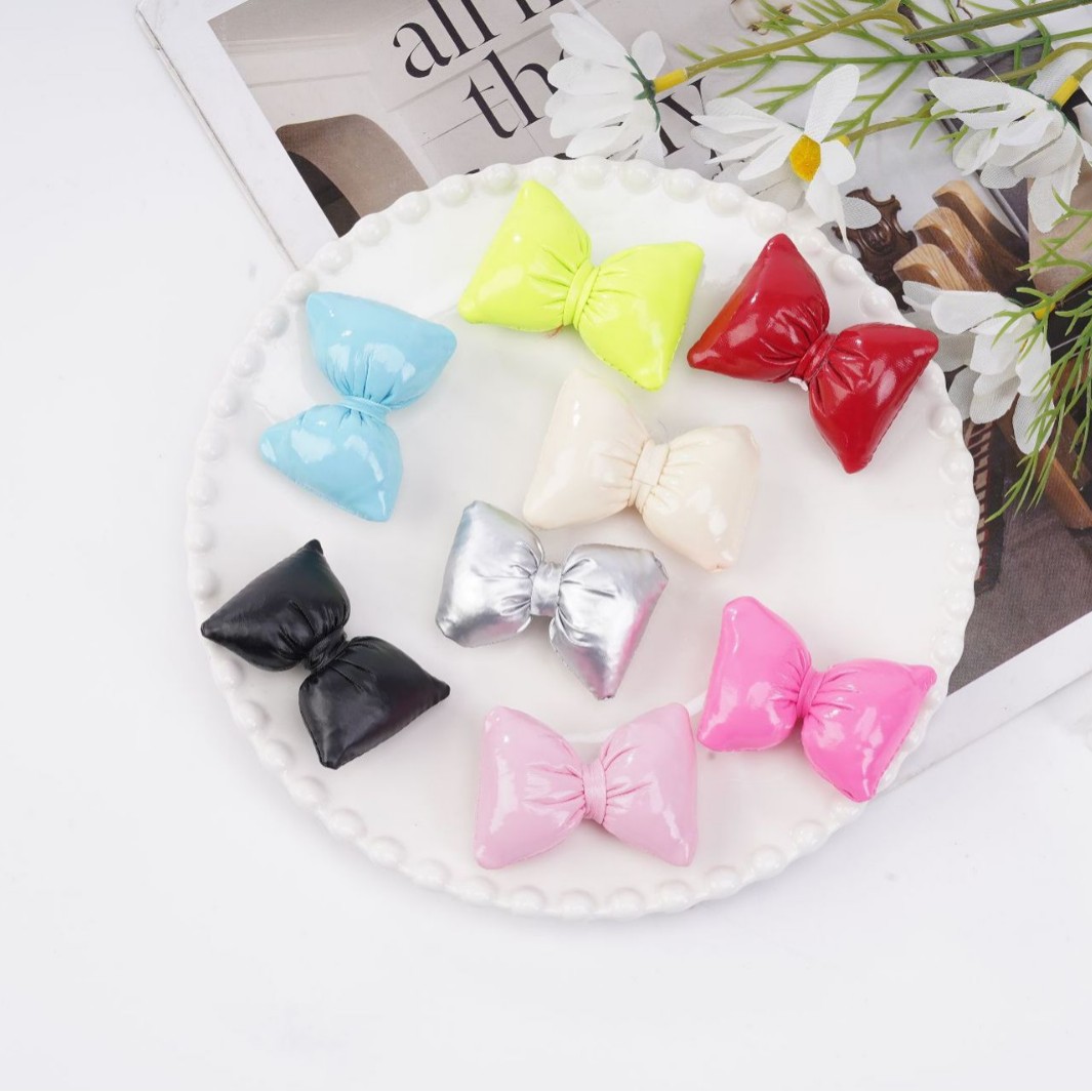 Polyurethane hair accessory with bow