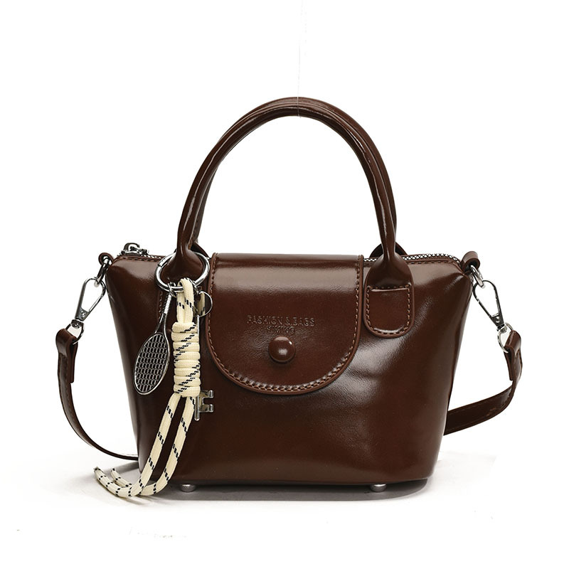 Bolso de mano retro coreano para mujeres 2025 nuevo estilo simple bolso de hombro de moda nicho de alta calidad bolso de mochila