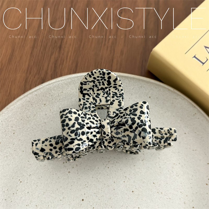 Black and white spots