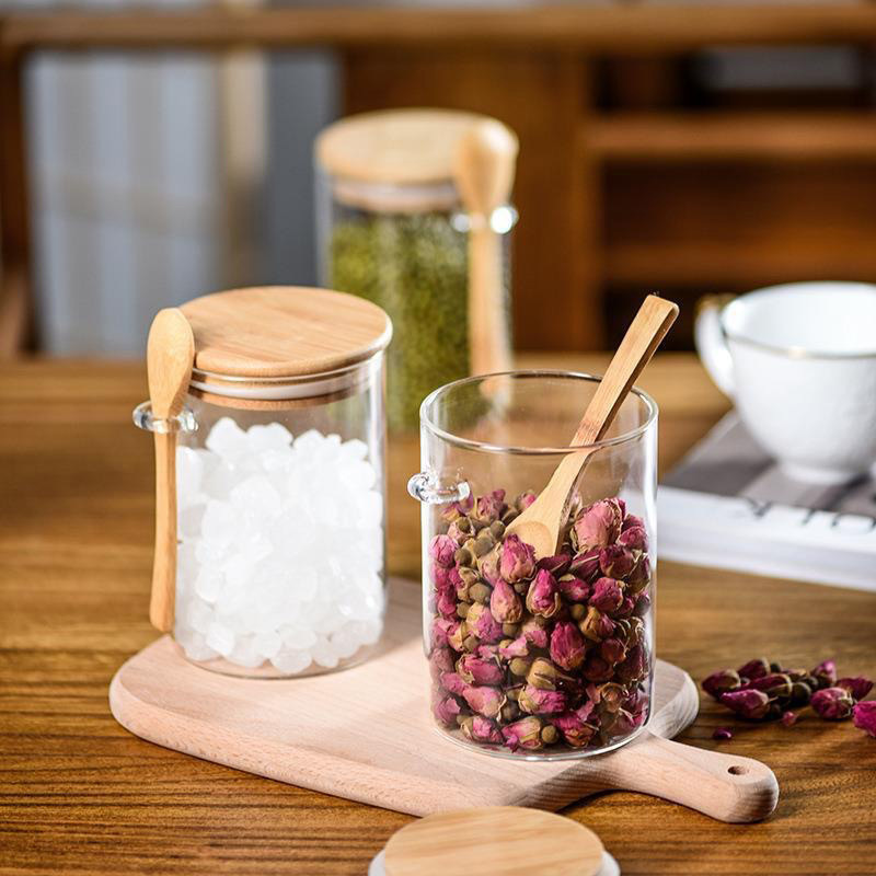 Gran por mayor vidrio sellado con cucharas de cocina granos frutas secas botella de almacenamiento cubierta de bambú con cucharas de condimento transparente doméstico