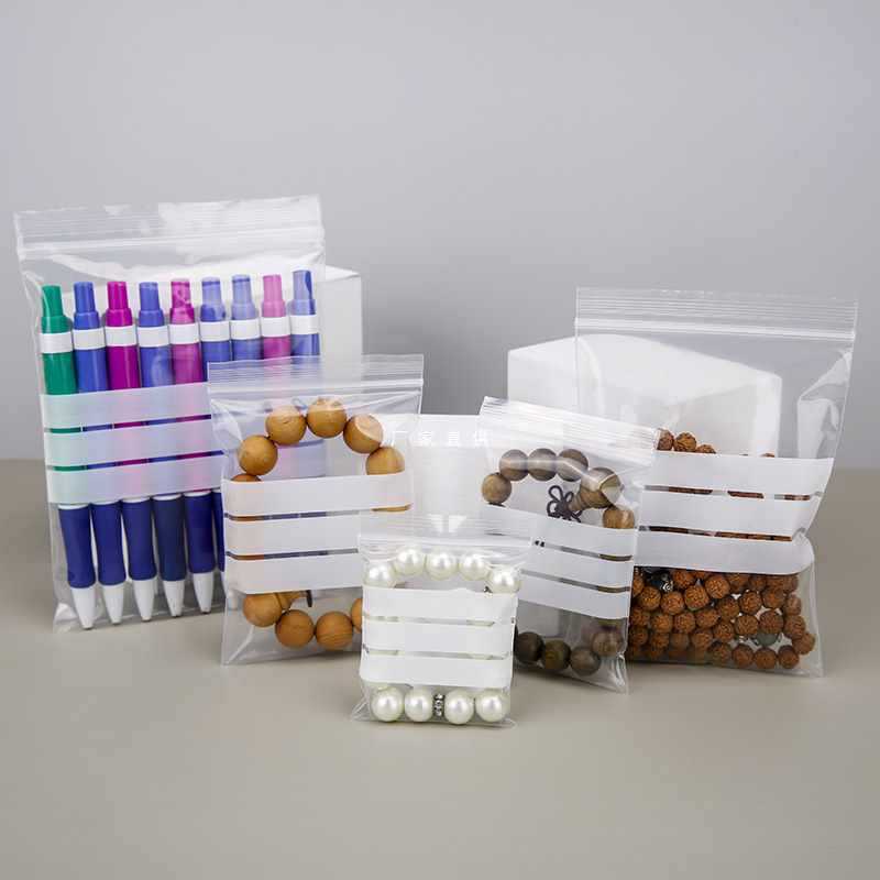 Wholesale writeable self-sealing bag transparent inner clothing laboratory sample bag packaging bags plastic sealing bag white strip can 