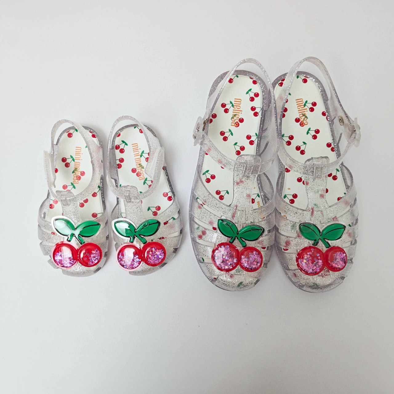 Детские прозрачные туфли Melissa для детей старшего возраста, пляжные туфли Melisa с закрытым носком и полым вишневым дизайном, детские прозрачные туфли с приятным ароматом.