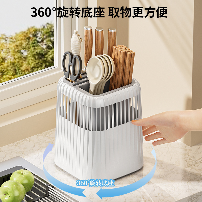 La encimera del cuchillo giratorio multifuncional se divide en celdas para drenar el estante de la cocina doméstica, los utensilios de cocina contienen cajas, palillos y cuchillos.