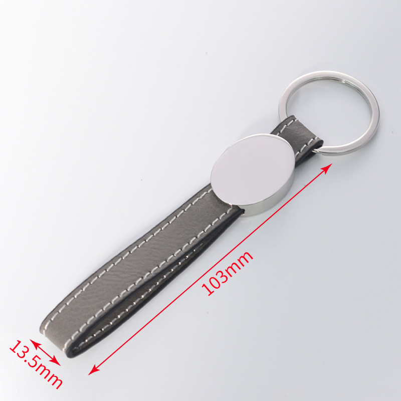 Transfronterizos en blanco spot embrión láser de cuero llavero de metal cuero colgante de automóvil personalizado regalos de negocios de alta calidad