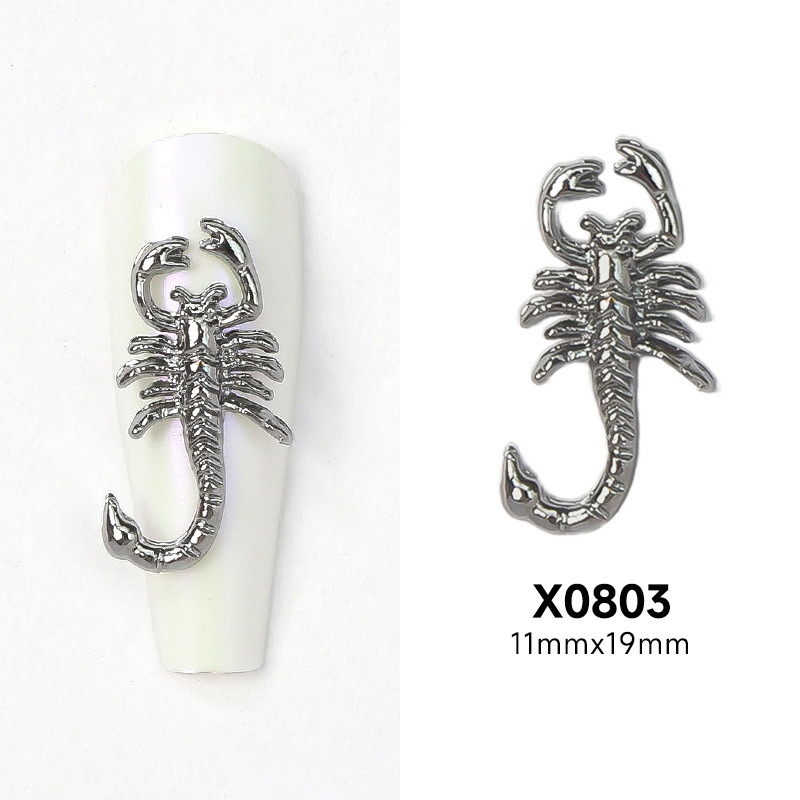 Nueva joyería de uñas de aleación de escorpión transfronteriza pistola de oro y plata pegatina de uñas negro tridimensional estatua de Buda joyería de uñas al por mayor