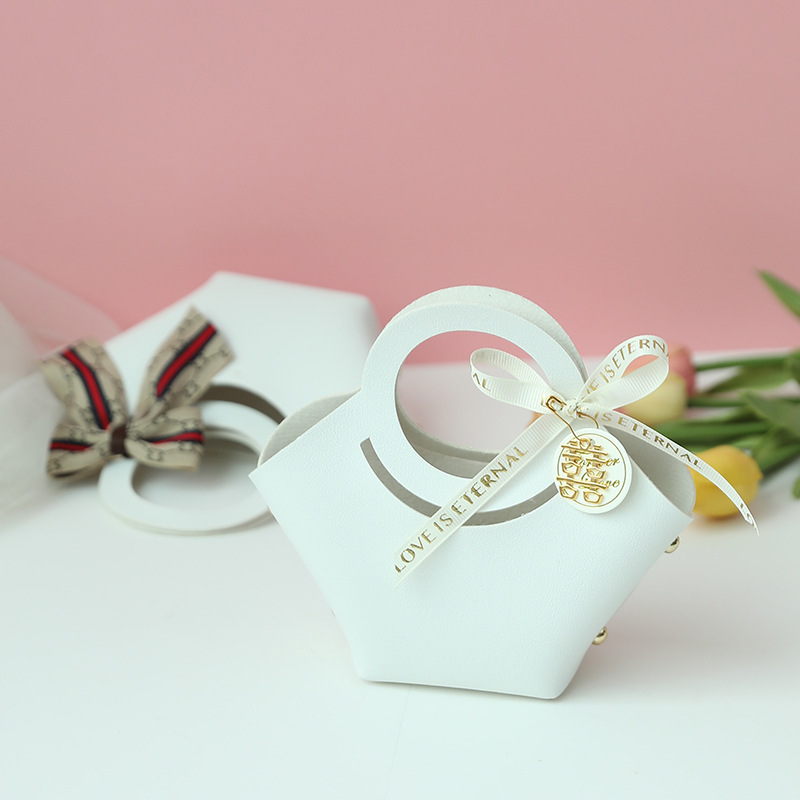 結婚式の喜糖の箱の皮質の空の箱のins風の結婚の喜糖の袋の手提げの花嫁のお土産のお返しの飴の包装|undefined