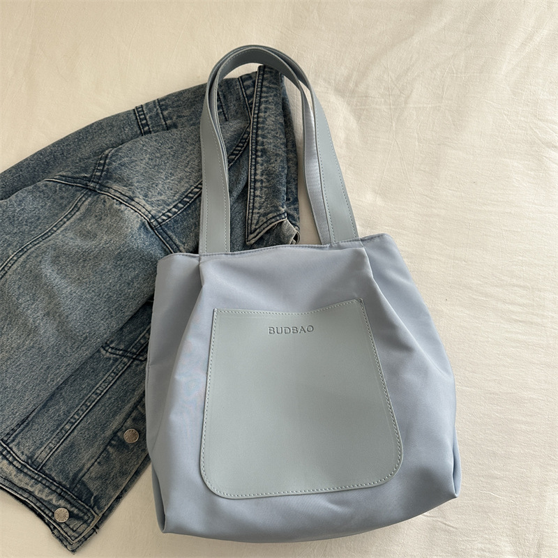 Bolso de mano simple 2024 invierno nuevo bolso de ocio versátil ains este año, bolso de hombro coreano para mujeres