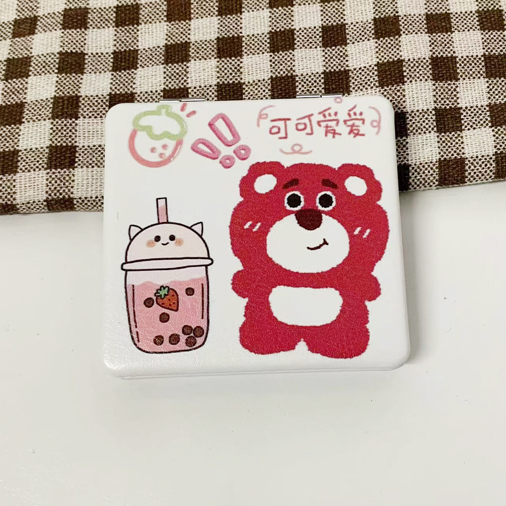 Nuevo perro Pacha osos de fresa doble cara plegable espejo de maquillaje tienda en línea tienda de espejo pequeño fábrica al por mayor