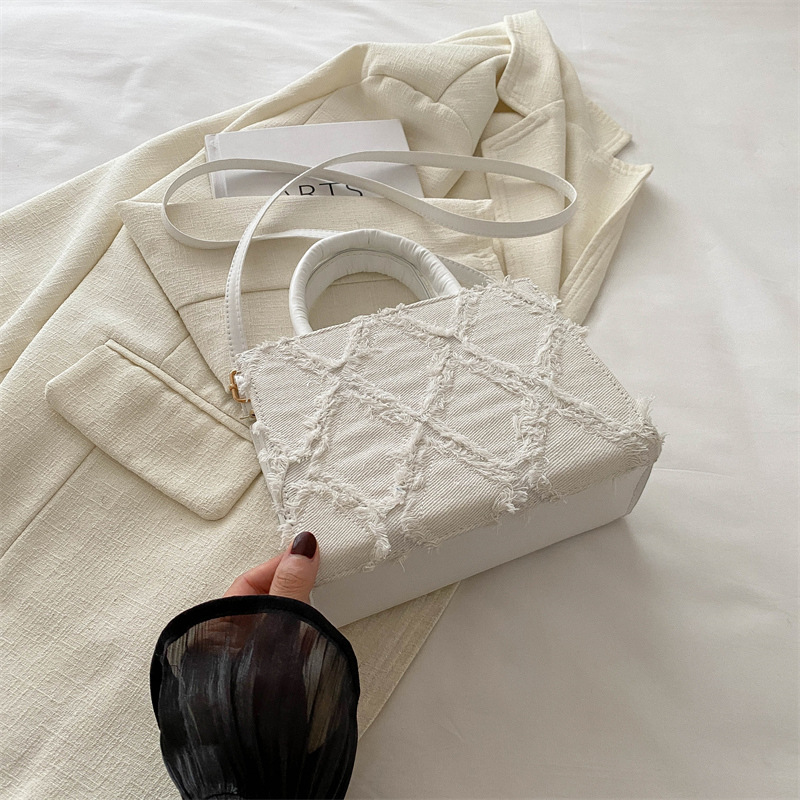 Bolso de moda de moda de Internet para mujeres 2024 nuevo estilo de moda de verano bolso de hombro portátil de mujer bolso de mochila jeans versátil