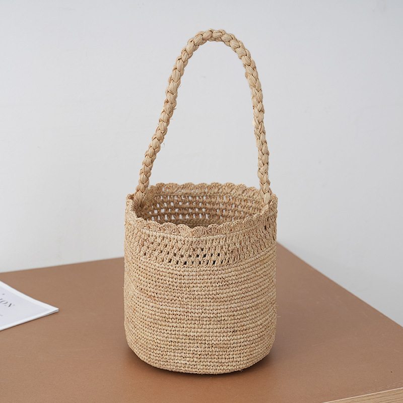 Ladies bag holiday woven raffia grass bucket bag hollow straw bag seaside leisure portable shoulder bag wholesale