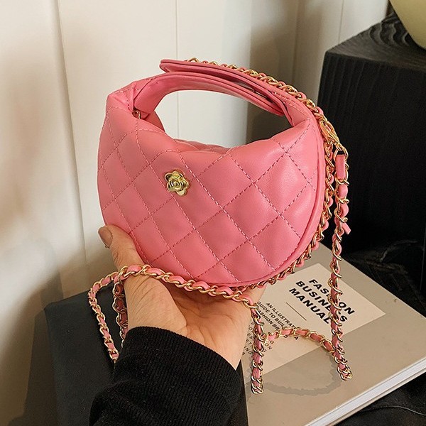 El popular bolso para niños mini camelia de este año 2024 nuevo bolso de cadena de diamante de textura de estilo nuevo bolso de niña de cambio de mensajero