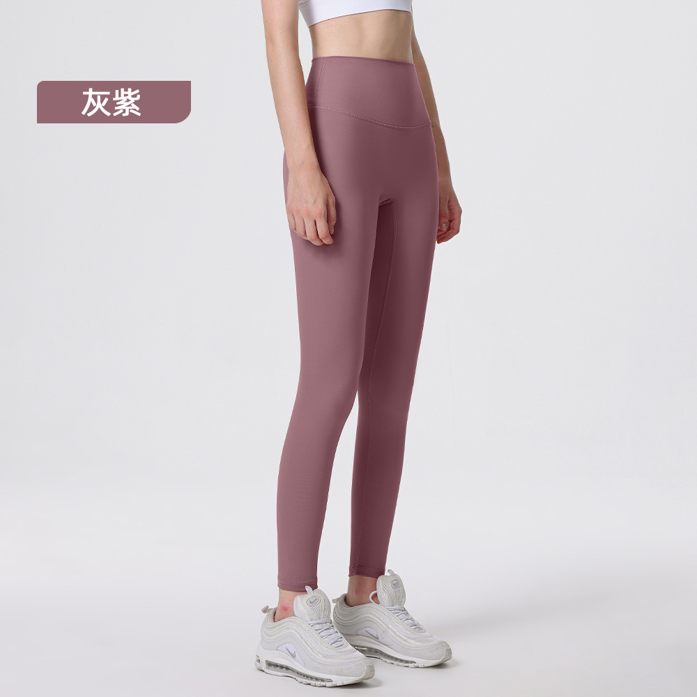 Nuevos deportes de yoga cintura alta desnuda sensación de no vergüenza línea piel-friendly levantamiento de la cadera del vientre que no se contrae la caída de la aptitud de las mujeres pantalones recortados