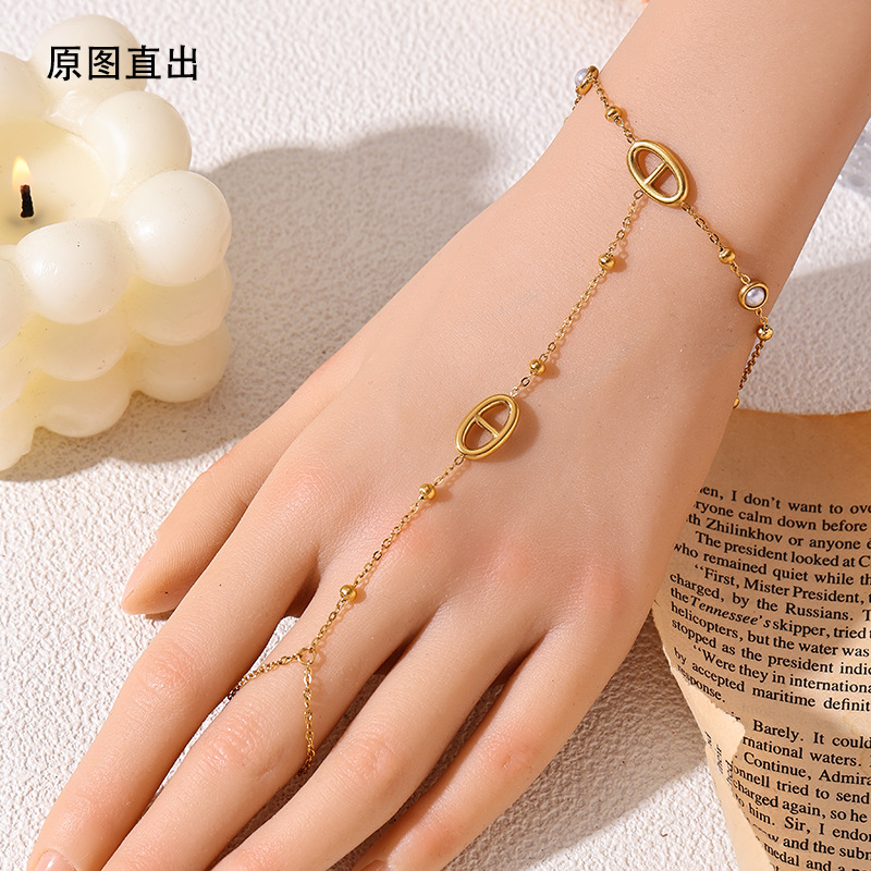 Tina Amazon explotador transfronterizo de acero inoxidable chapado en oro de 18 quilates pulsera de dedos nicho cerdo diseño nariz joyería de mano mujer