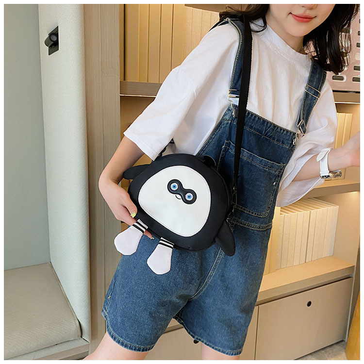 The new 2024 children's egg-shaped party backpack is a cute cartoon canvas single-shoulder bag and a fashionable and stylish small backpack undefined