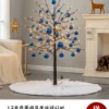1.2 meters of light tree with blue ball/ giving a tree skirt