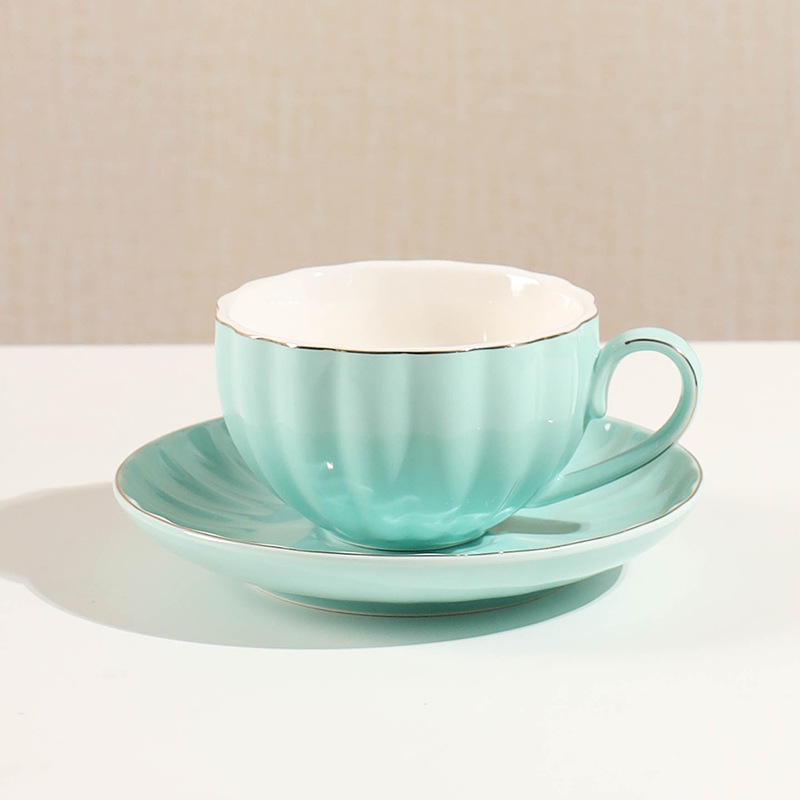 Comercio exterior de cerámica taza de café platillo juego de té regalo simple flor taza de té hogar taza de agua café traje de regalo con estante