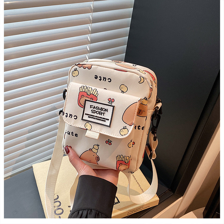 Cartoon animal print, many pockets, few bags, single-shoulder bag for girls, large capacity, cute graffiti, lightweight schoolbag for primary and middle school students undefined