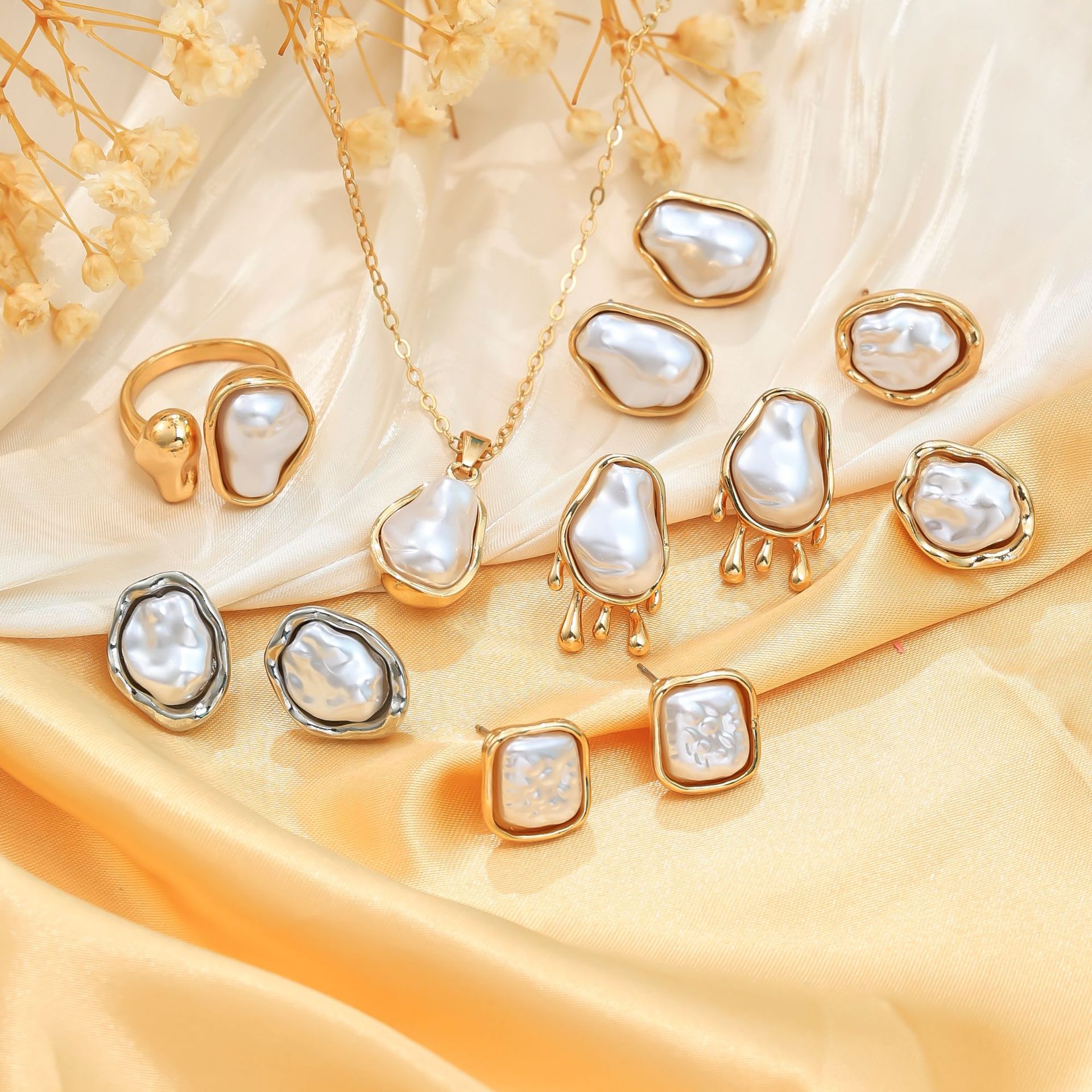 Venta caliente transfronteriza europea y americana, conjunto de anillos de collar, pendientes de moda de perlas del sexo opuesto, pendientes de mujer de alta calidad