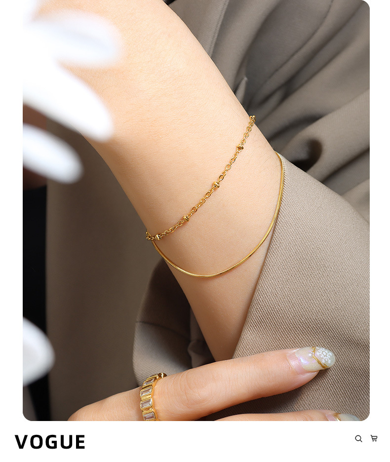 Ins Jewelry Exquise chaîne à double couche en os de serpent Bracelet exquis Chaîne à perles enveloppée Pièce à main en acier au titane plaqué or_voghion.com