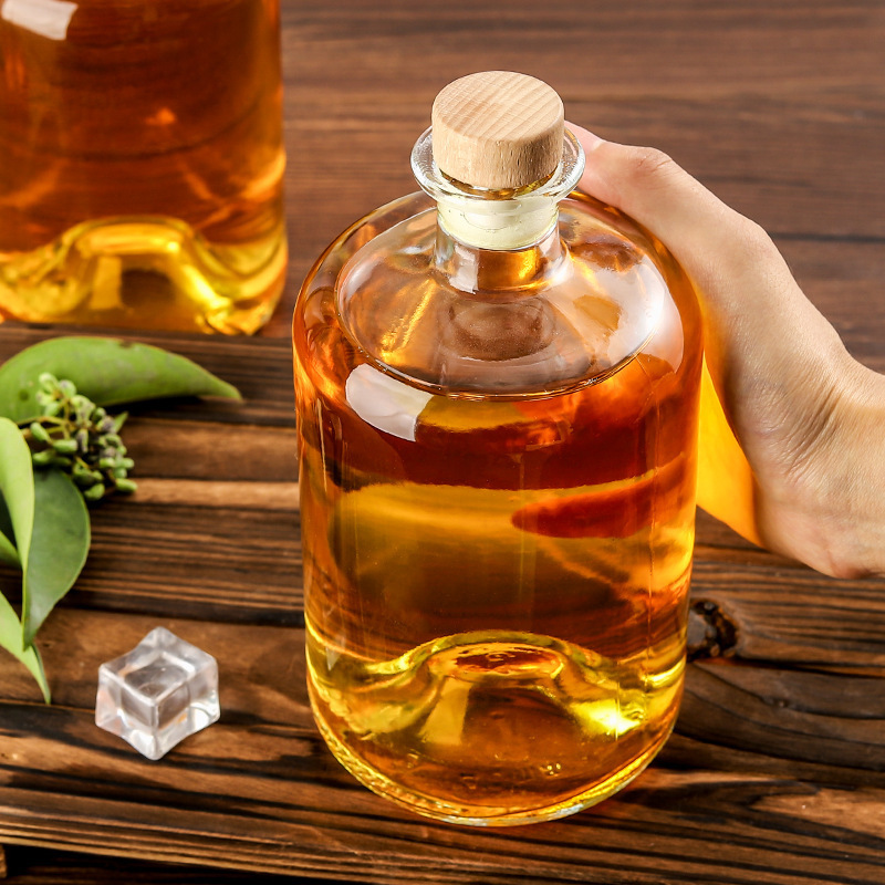 Botella de vodka al por mayor Botella de vino de fondo cóncavo Botella de vino extranjero Botella de vino amarillo de gran capacidad Botella de vino de ciruela transparente Botella de vino de frutas de vidrio