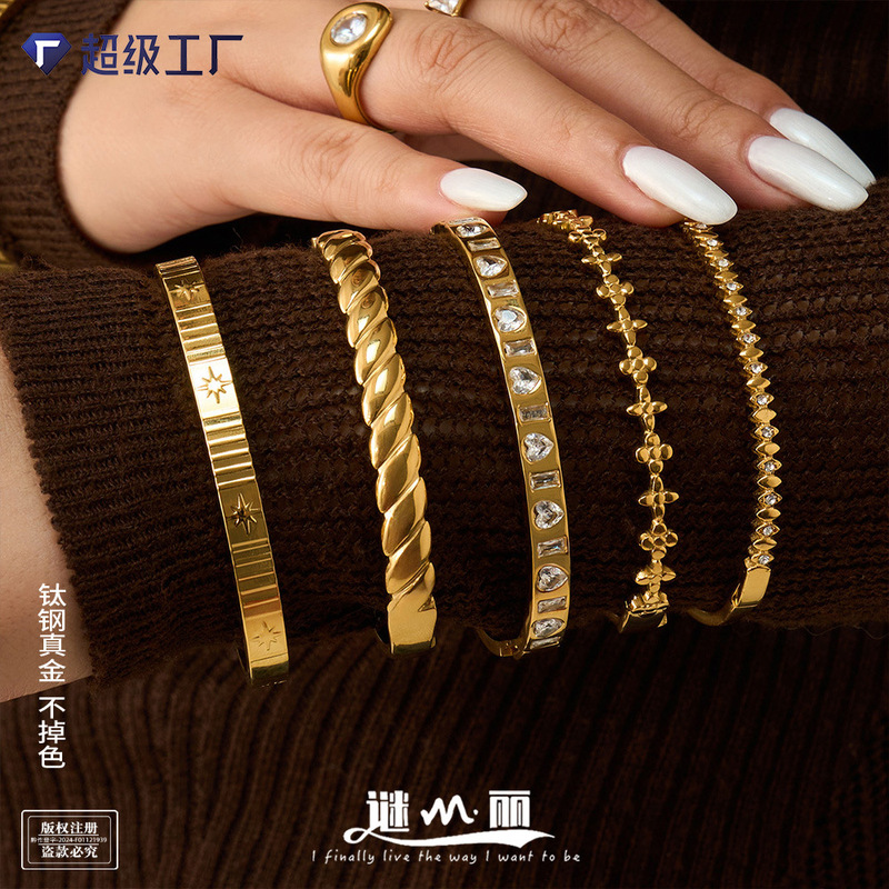 Mysterious INS-style stainless steel bracelet, 18K gold cross flower zircon bracelet for women, light luxury and high-end elegant jewelry Mysterious INS-style stainless steel bracelet, 18K gold cross flower zircon bracelet for women, light luxury and high-end elegant jewelry