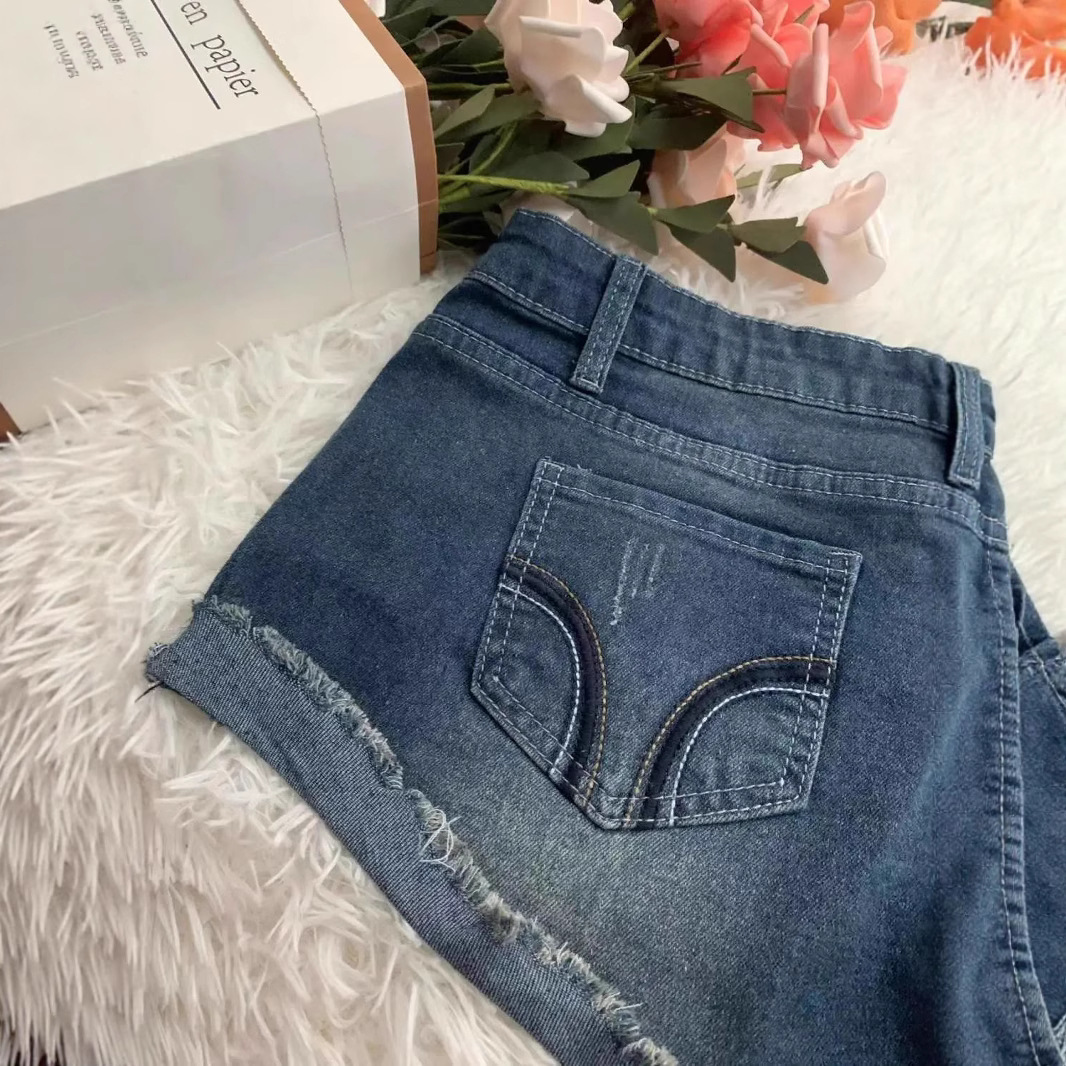 レトロなデザインのカールジーンズ女性のための夏のホットガールセクシーなローウエスト超ショートパンツタイトなヒップカバーホットパンツ