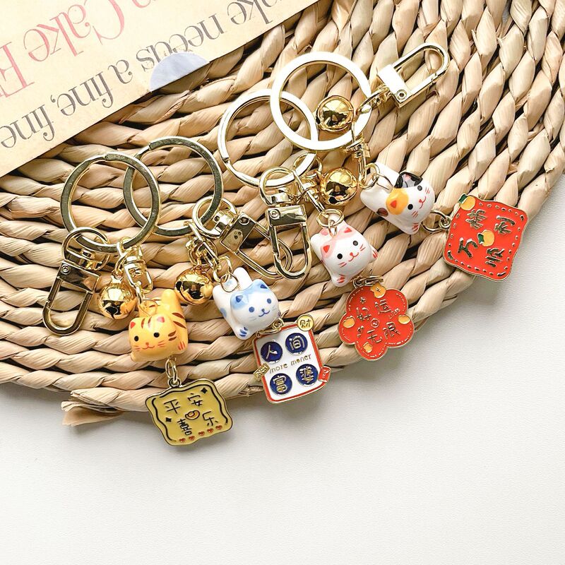 J1016 Peace and Joy Bring in Wealth and Treasure Ceramic Bring in Wealth and Treasure Cat Bell Keychain Bag Pendant Metal Gift Cartoon Japanese Style